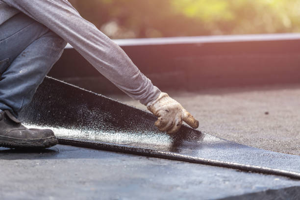 Professional Basement Waterproofing technician working in Woodlawn, OH